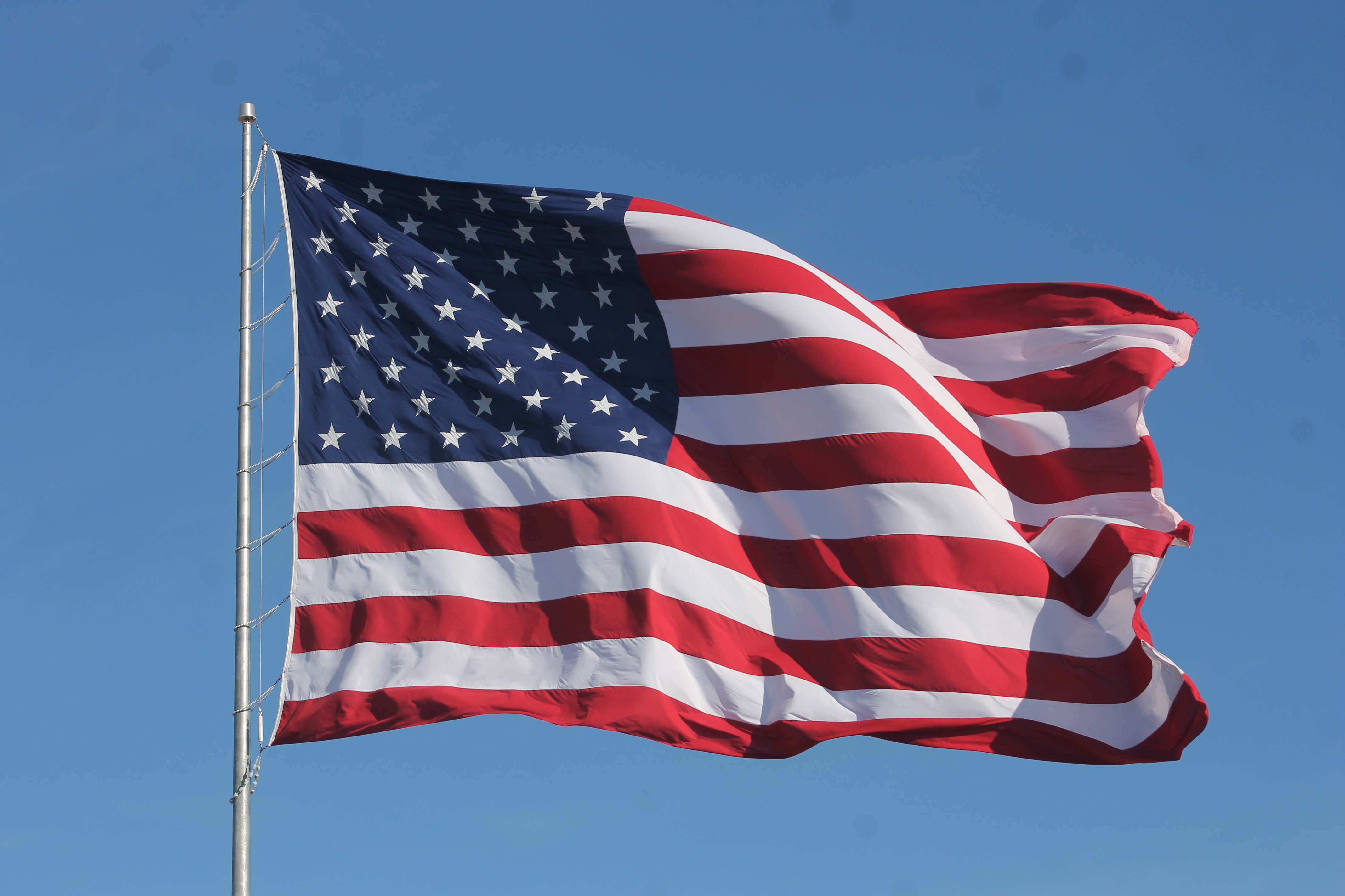 American flag waving on a flagpole